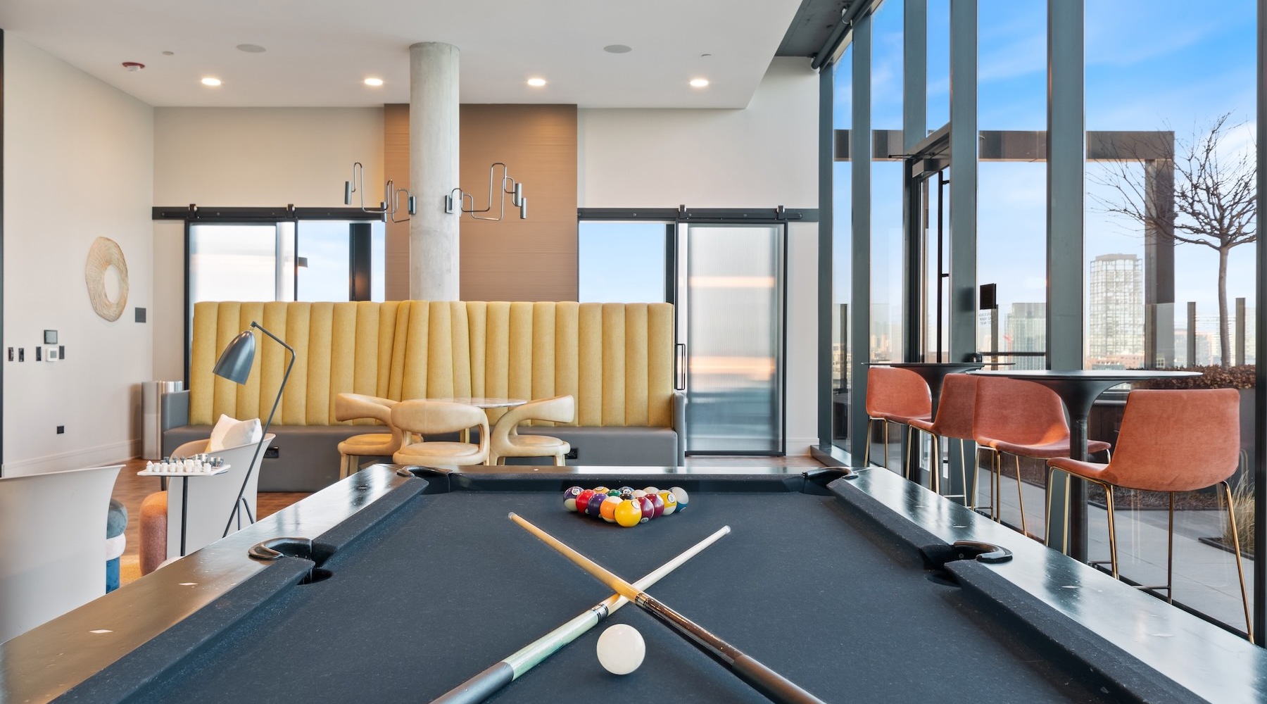a clubroom with a pool table
