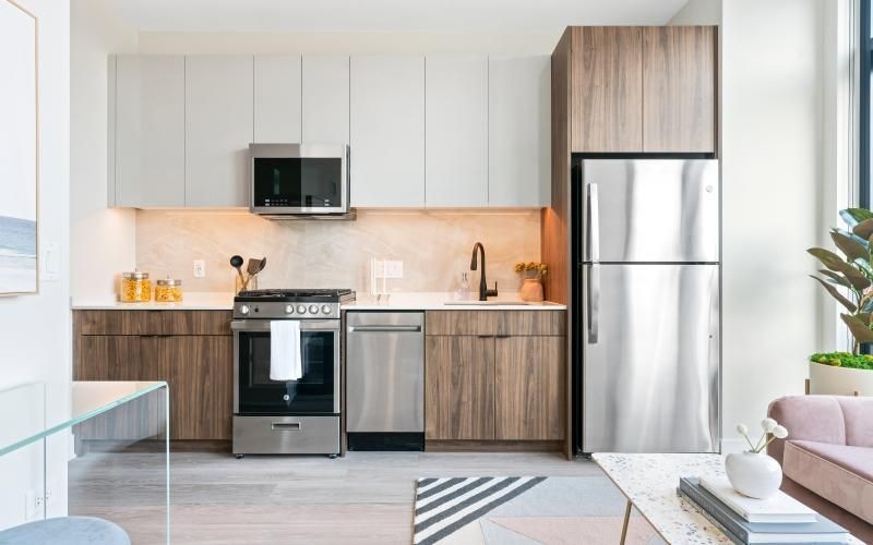 a kitchen with white cabinets